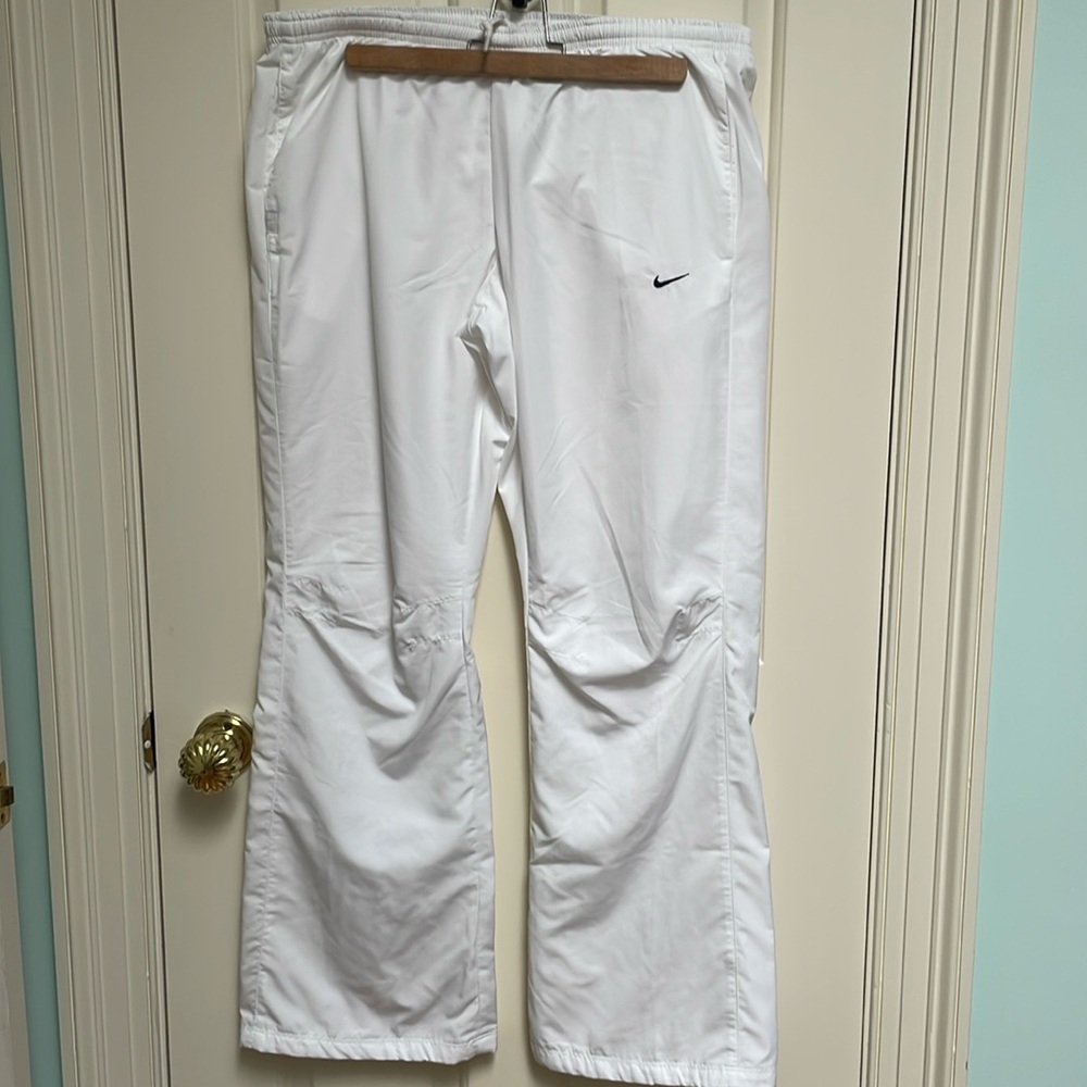 Nike sz L women's lined white athletic pants w bottom side zips warm-up